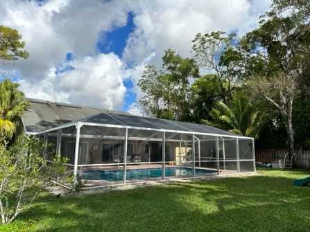 screen pool enclosure with roof