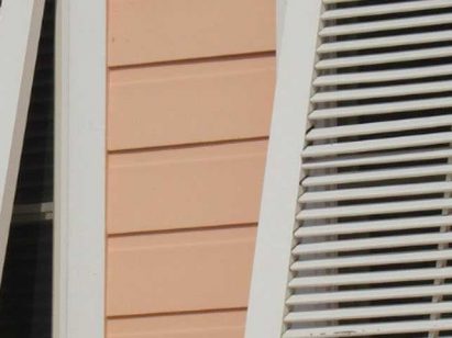 Close up of beige window shutters