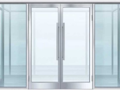 Modern impact glass door with metal frames and handles on transparent background that can be installed on Coastal Homes