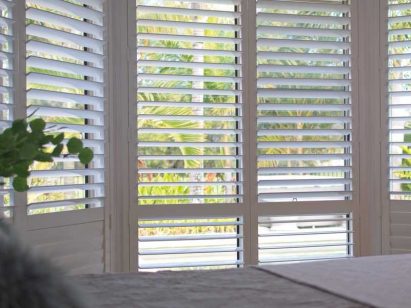 Impact shutter windows in white for luxury homes