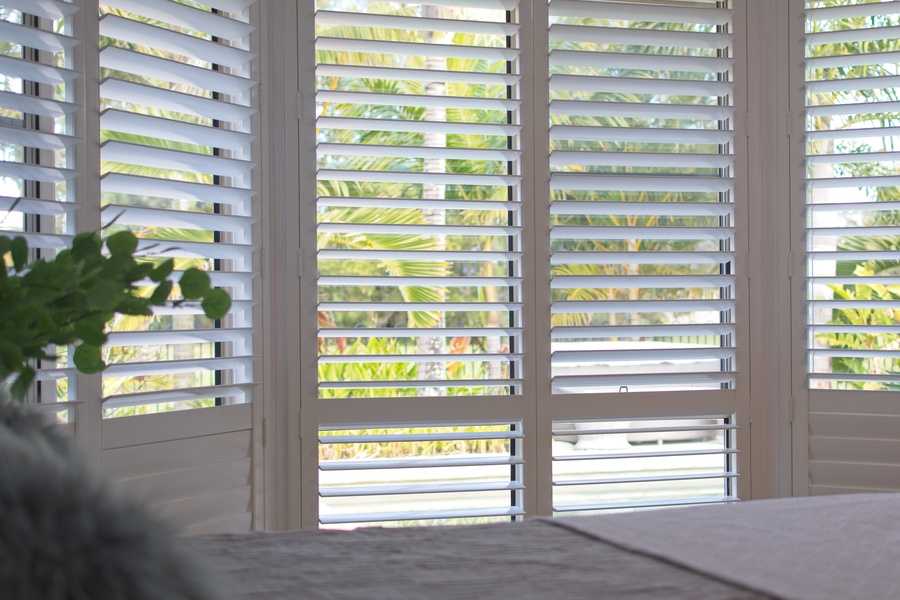 Impact shutter windows in white for luxury homes