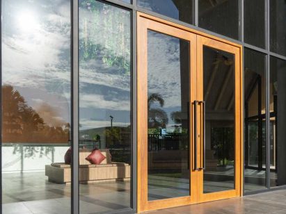 Impact glass door entrance to a large apartment