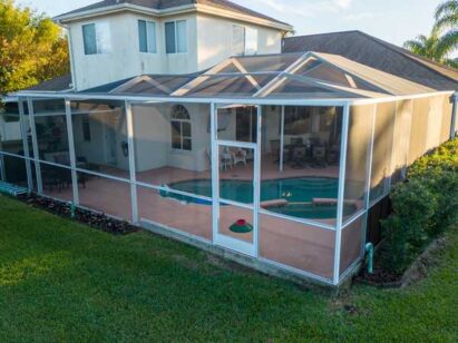 house with pool screen enclosure