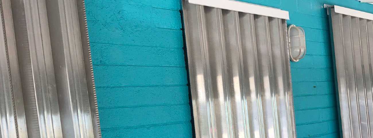 Close up of sheet metal window shutters