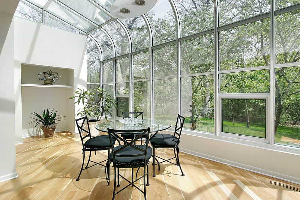Sun room in luxury home with ceiling windows